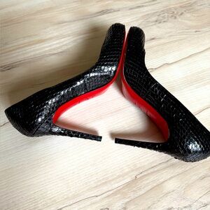 Christian Louboutin black python snakeskin pumps with Red Soles rounded toe